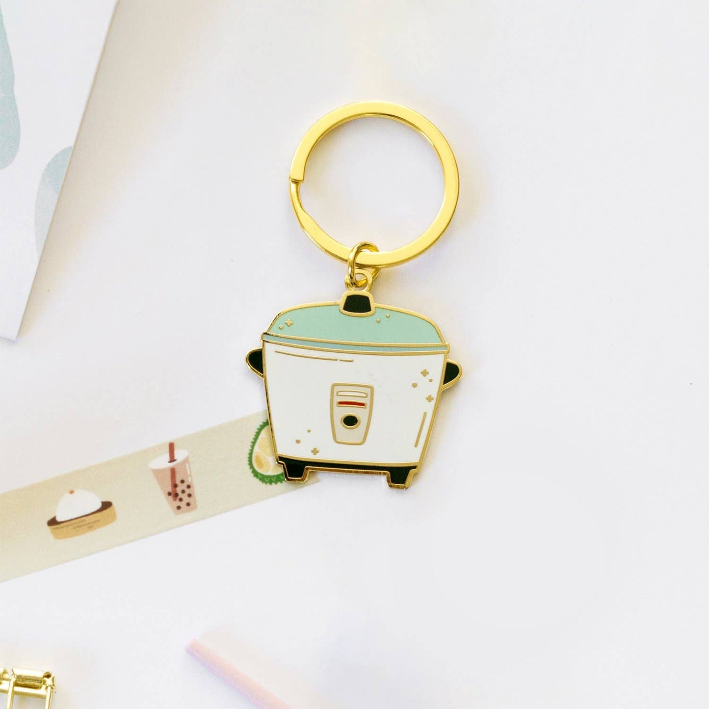 rice cooker replica on a keychain
