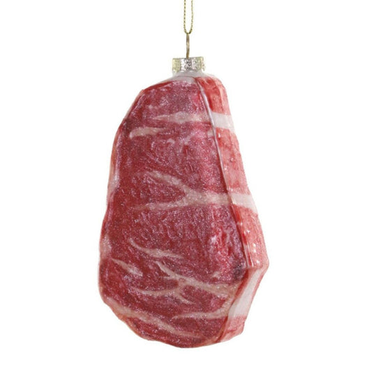 Raw steak-shaped ornament on a white background