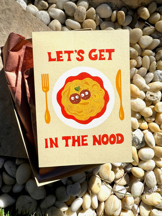 Greeting card that reads "Let's Get in the Mood" with a plate of spaghetti and meatballs and a knife and fork 