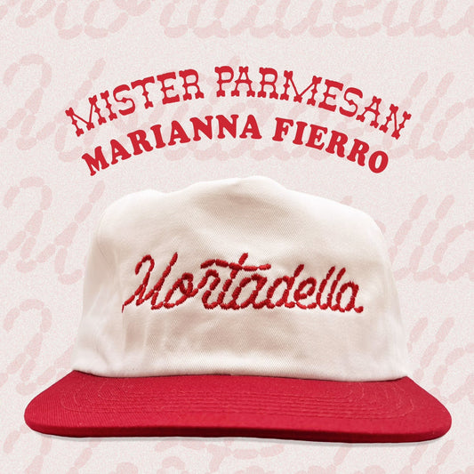 Mortadella hat with white top and red bill. Red imbroidery that reads "Mortadella" in linked sausages. The top says Mister Parmesan Marianna Fierro on two lines.