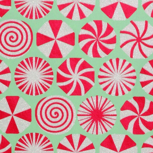 Peppermint candies patterned gift wrap sheets with glitter.
