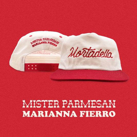 Red imbroidery that reads "Mortadella" in linked sausages. The second hat shows that back with the snap closure detail. The bottom of page says Mister Parmesan Marianna Fierro on two lines.