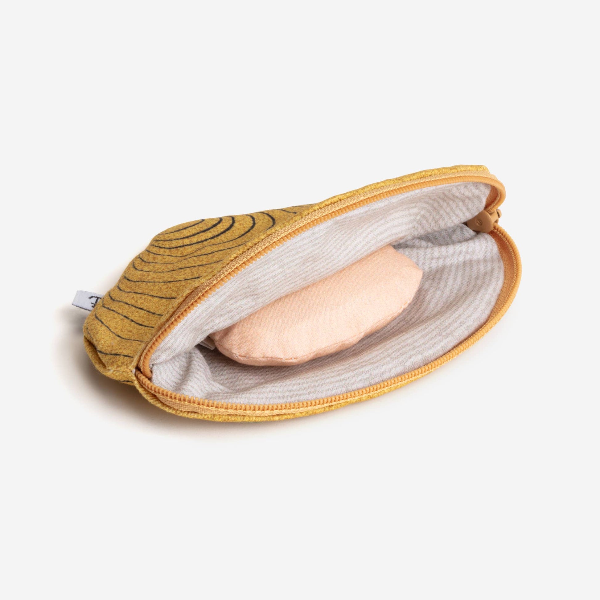 Interior of mustard colored clam shell