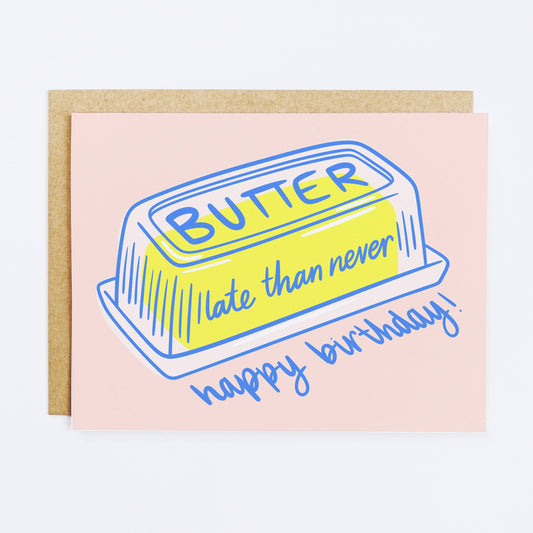 Greeting card with butter on it with text that reads "Butter late than never. Happy birthday!" 