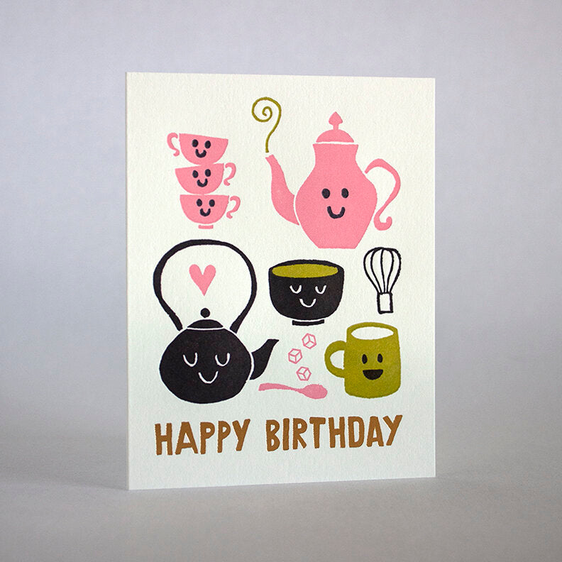 Birthday greeting card with different teapots + teacups.  