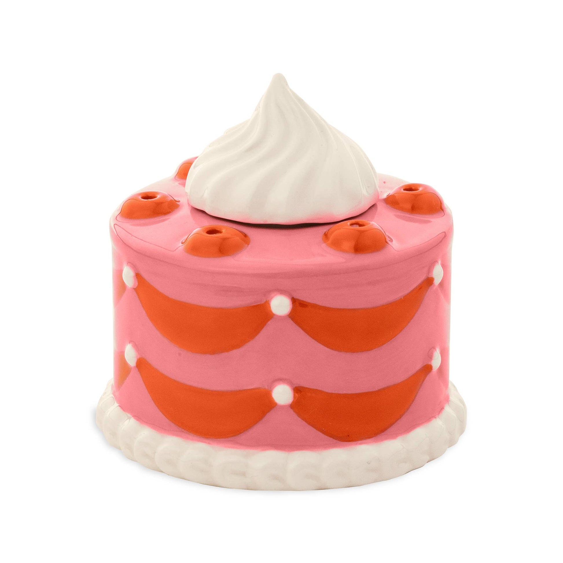 Ceramic cake match holder and striker --shaped like a whole, round cake and painted red and pink. Has a dollop of whipped cream on top