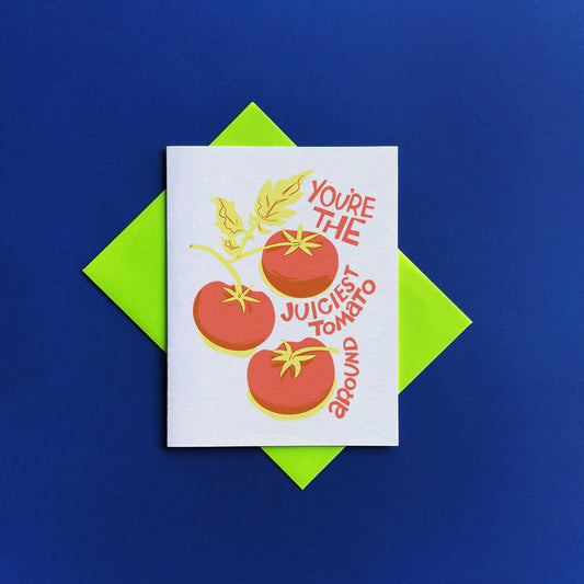 Greeting card -- white background with red tomatoes on a vine in the center with text along the right side that reads "You're the juiciest tomato around" 