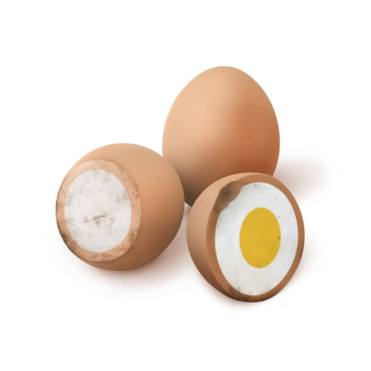 3 brown egg erasers, each revealing a different layer -- brown/whole, egg white, egg yolk