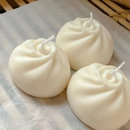 Decorative candles shaped like Chinese Bao (steamed buns).
