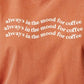 Close-up of text "always in the mood for coffee" repeated three times in wavy pattern.