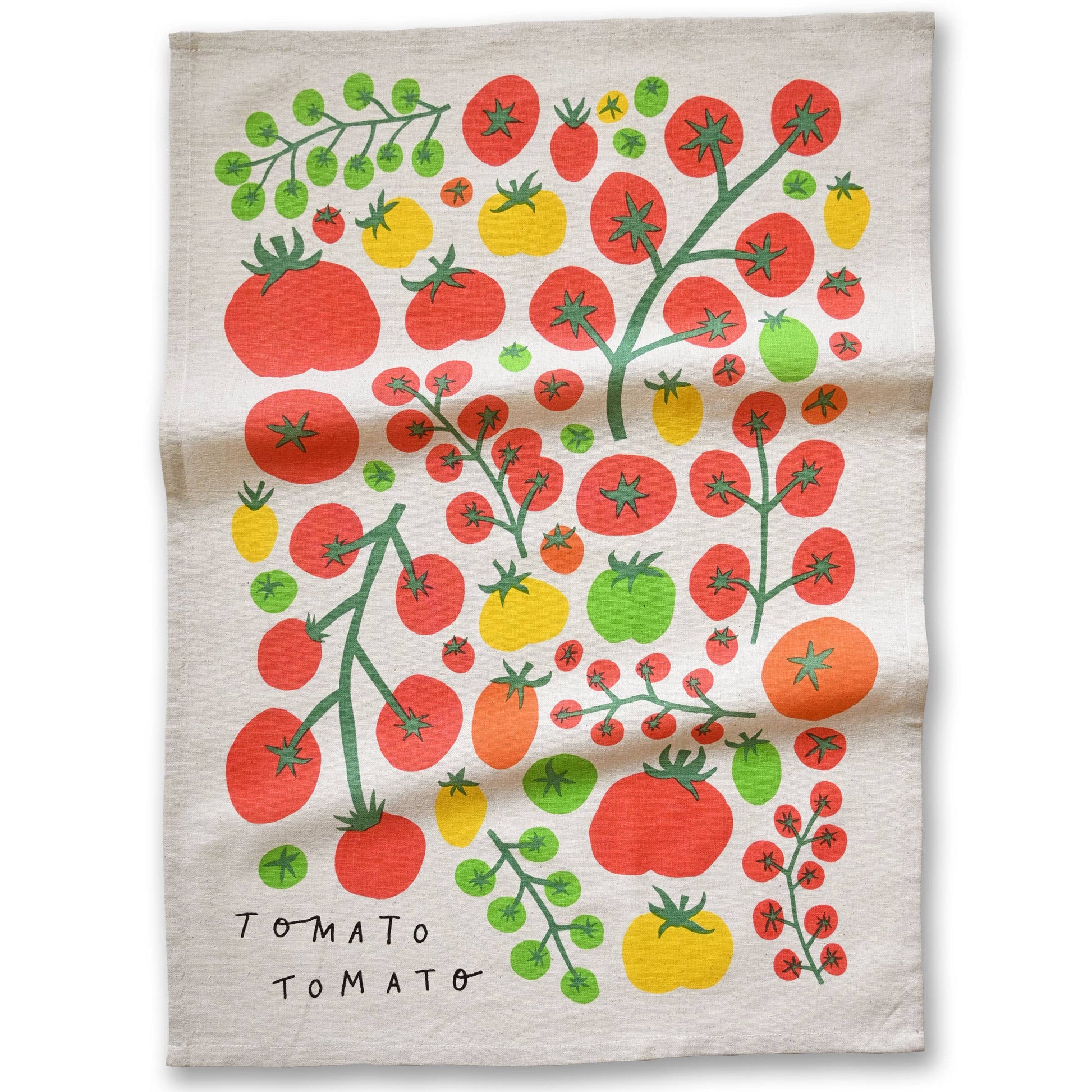 A square off-white fabric tea towel featuring a colorful retro-style illustration of tomato vines, fruits, and the text 'TOMATO TOMATO' printed in black at the bottom left.