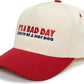 Beige and red cap with text 'It's a bad day to be a hot dog' on a white background