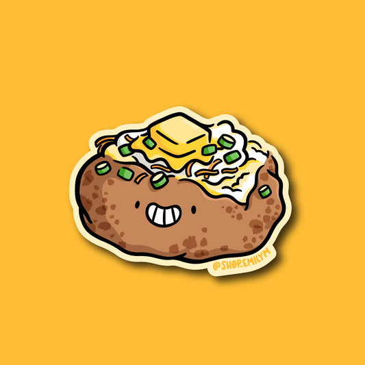 A die-cut sticker featuring a cute cartoon potato dish with a smiling face, topped with butter, cheese, and green onions, shown on a solid yellow background.