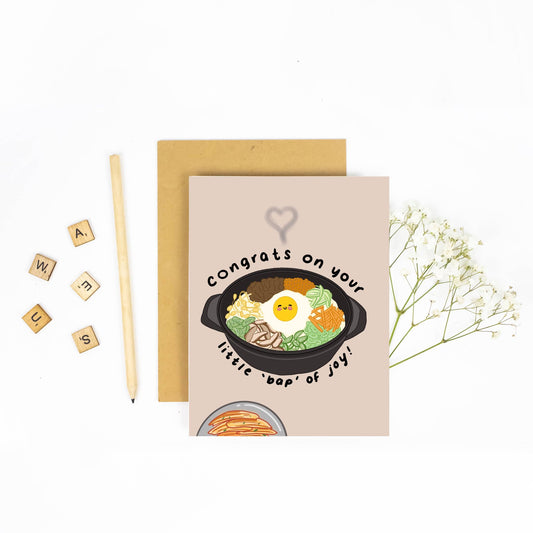 Greeting card with food illustration and text, accompanied by a pencil and decorative elements on a white background.