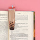 Boba Bookmark staged in a book.