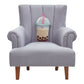 Gray armchair with a decorative pillow shaped like a boba drink on a white background