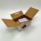 Mini bakery sticker box that is open to reveal a little invoice sticker