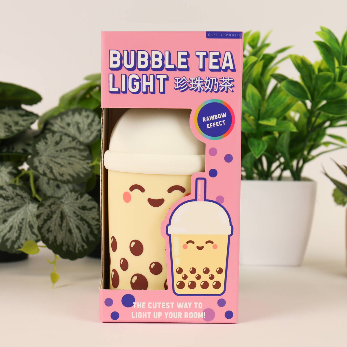 Bubble tea-themed light in packaging with plants in the background