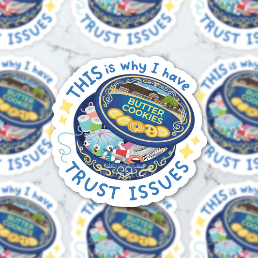 Sticker that looks like a Danish butter cookie tin, slightly opened to reveal you've been bamboozed and it's filled with sewing supplies! Text reads "THIS is why I have TRUST ISSUES"