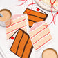 Napkin cake slices and coffee cups on a white background