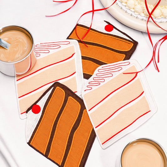 Napkin cake slices and coffee cups on a white background