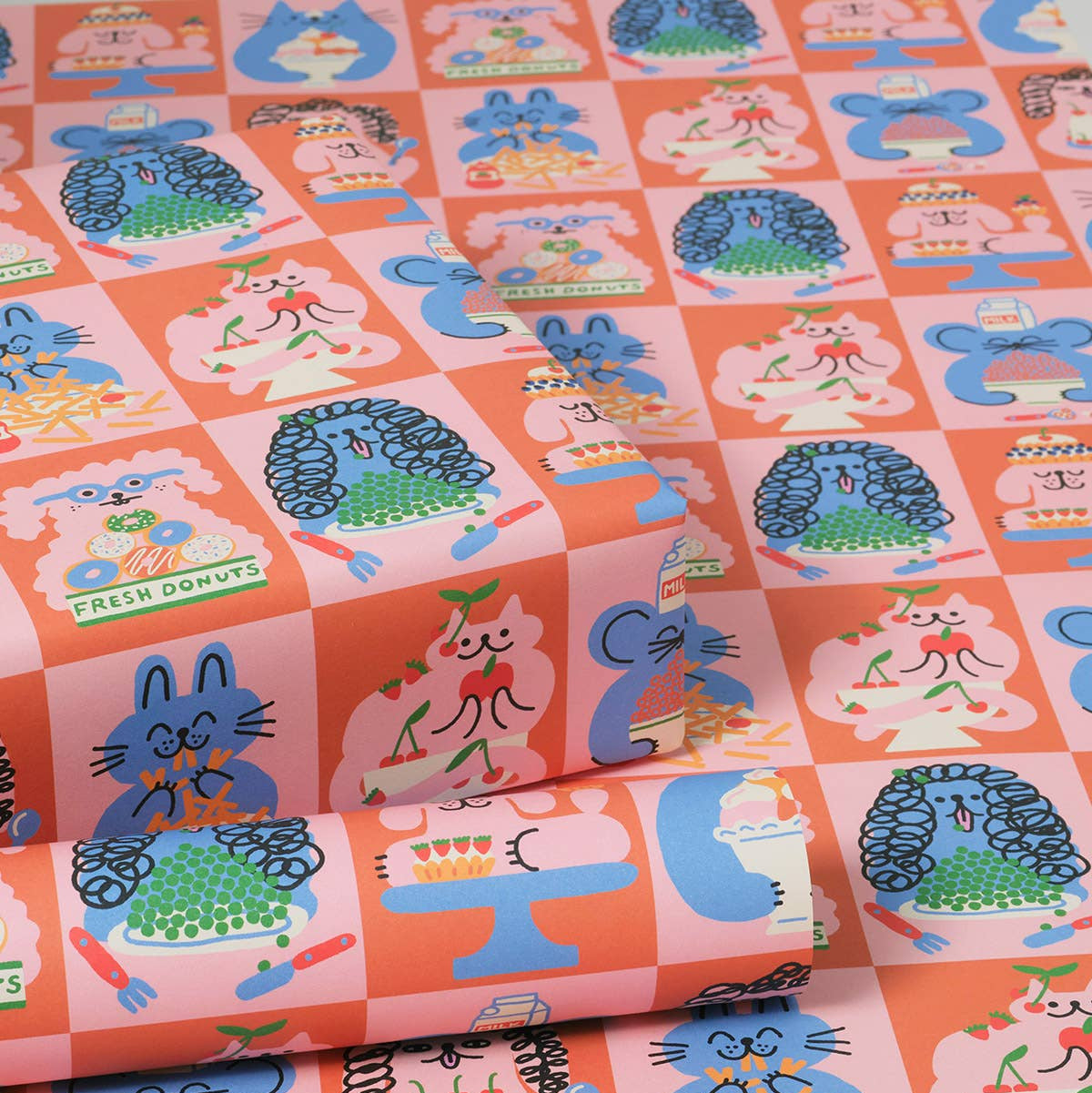 Patterned gift wrap with cartoon characters and food items on a checkered background