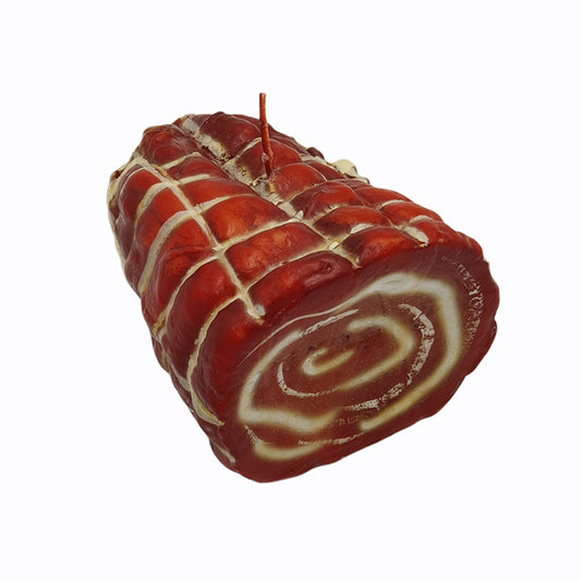 Candle shaped like a cut open capocollo -- one wick in top center 