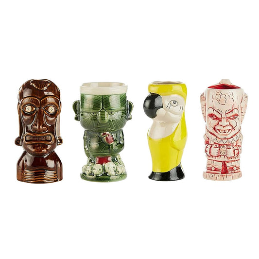 Four unique ceramic mugs with different tiki mug designs on a white background