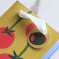 wine gift bag with a tomato illustration on a yellow background