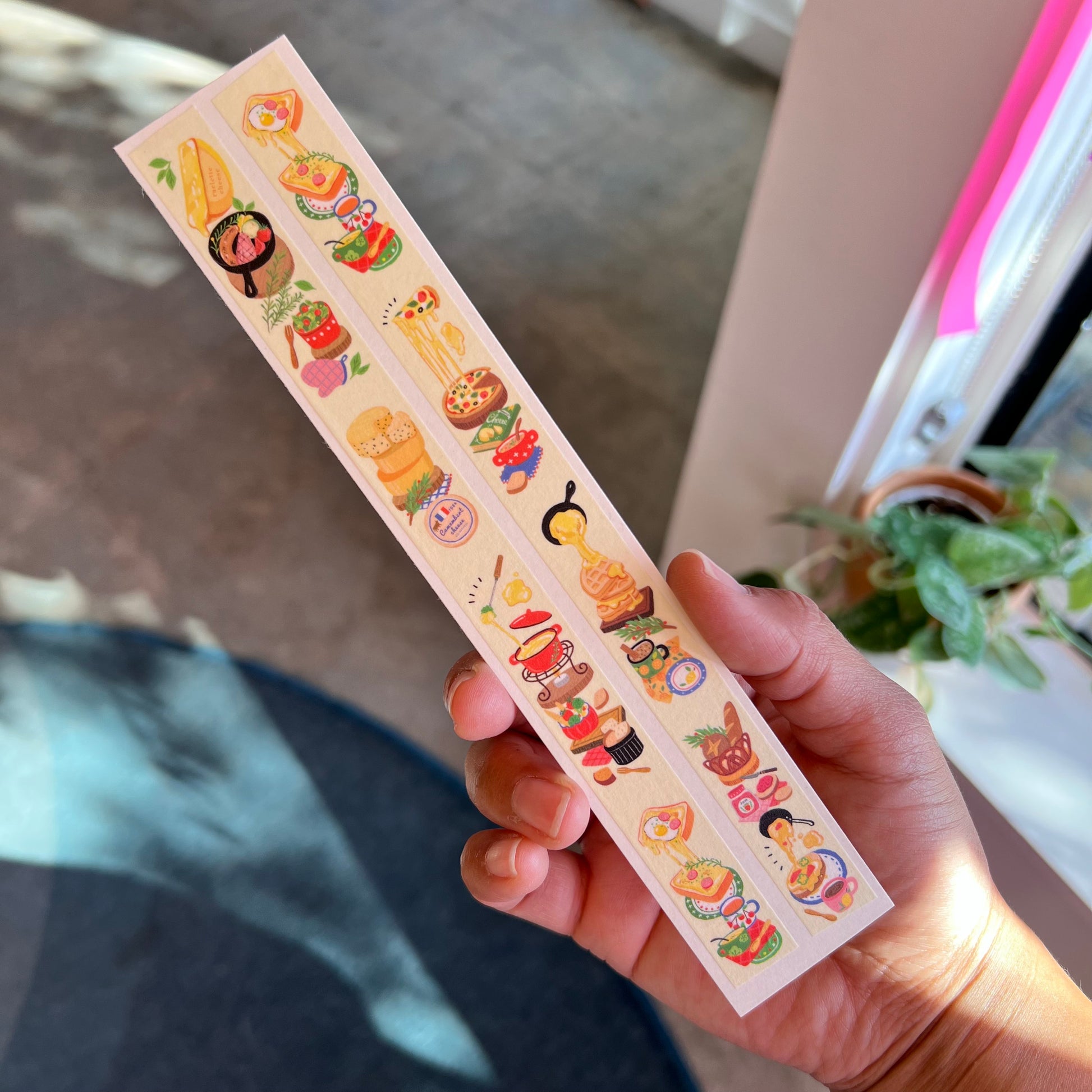 Cheese Washi Tape pulled out along a strip to reveal all of the different dishes in the roll.