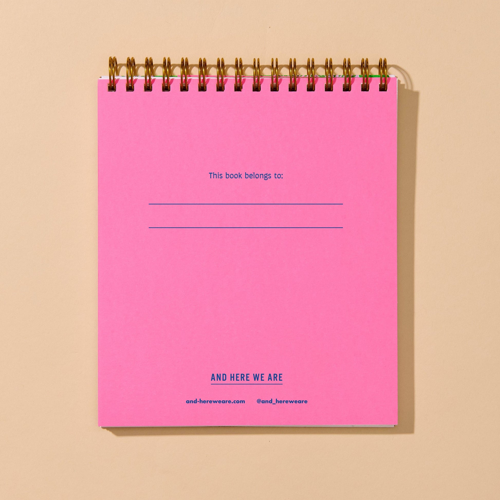 inside page of the cherry doodle book. Bright pink with text "this book belongs to:" and branding logo at the bottom 