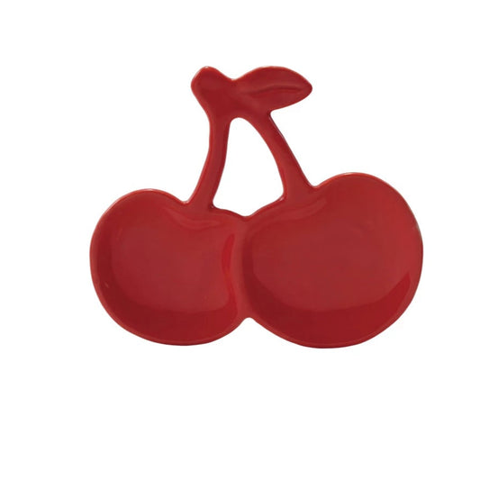 Red ceramic cherry-shaped trinket dish on a white background