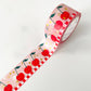 pink washi tape with gold foil accents and red cherries on it 