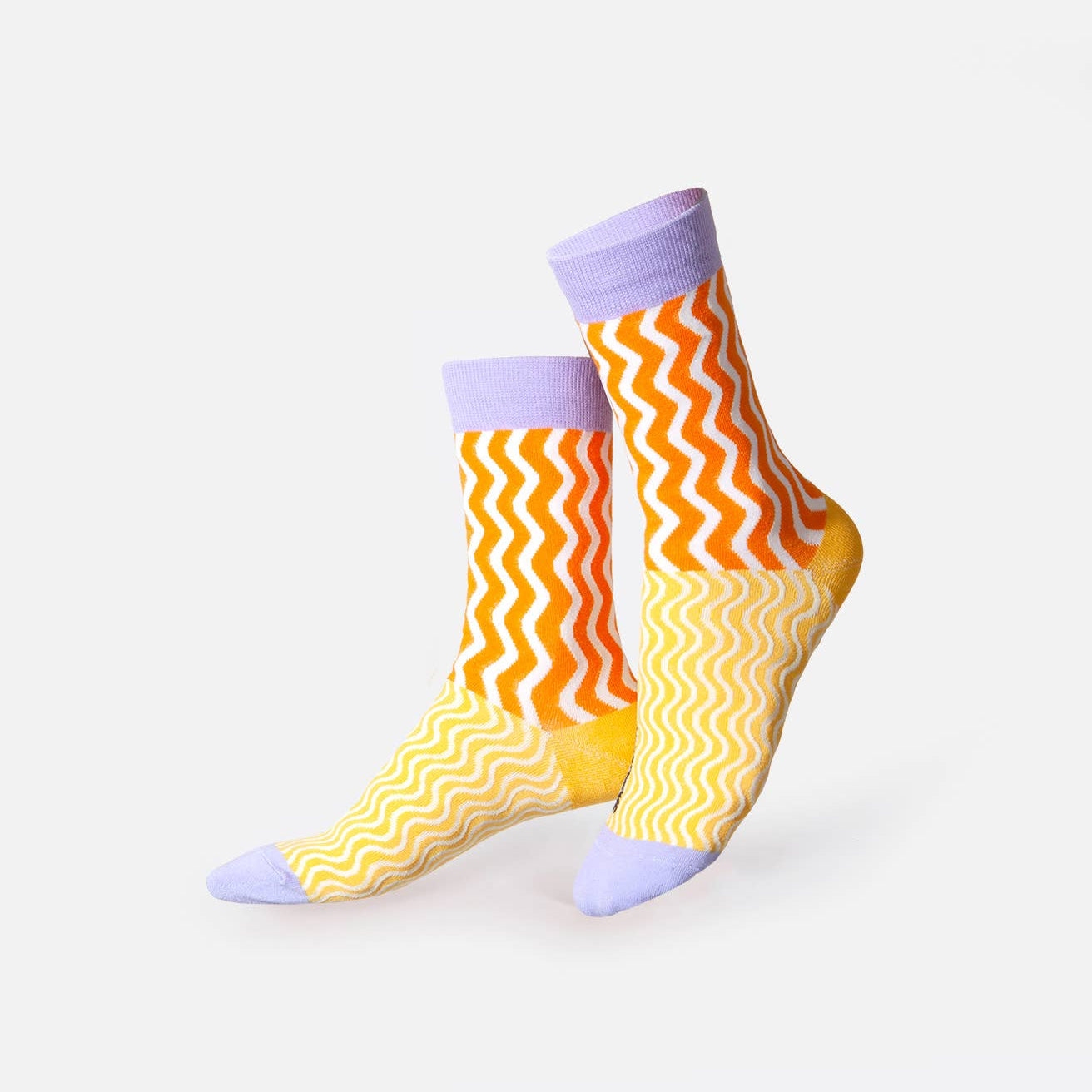 Colorful zigzag patterned socks on a white background