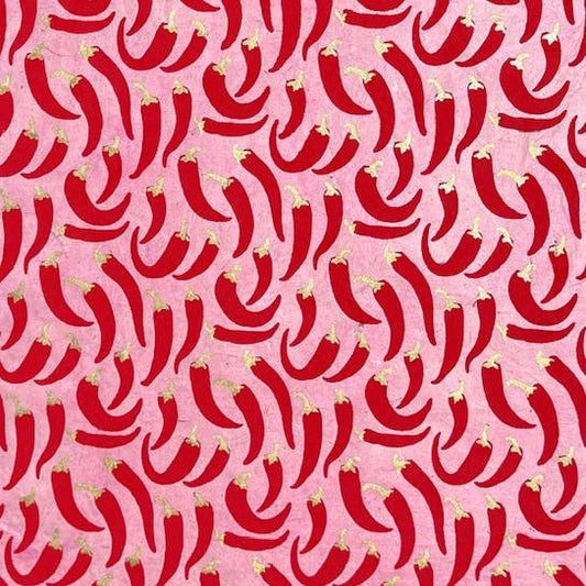vibrant wrapping paper with light pink background and red chili pepper pattern 