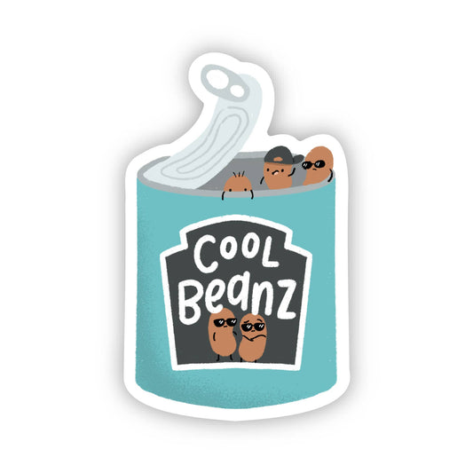 A die-cut sticker featuring a turquoise can with a stylized open lid and cartoon beans wearing sunglasses. The front label reads 'COOL Beanz' in white text on a dark gray shield shape, with two small brown beans wearing black caps peeking out from the top.