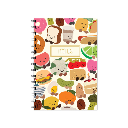 Notebook with cartoon food characters on a white background