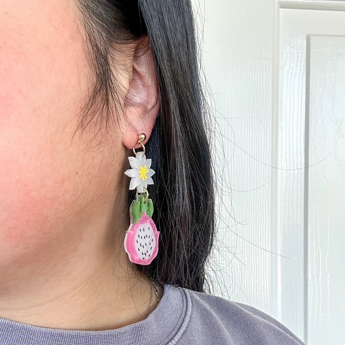 dragon fruit dangle earrings for scale 