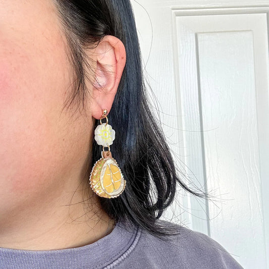 Durian dangle earrings for scale 