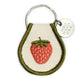 Embroidered Strawberry key chain with a single strawberry and bordered with an army green threading. Metal ring has an extra metal tag that says: Three Potato Four.