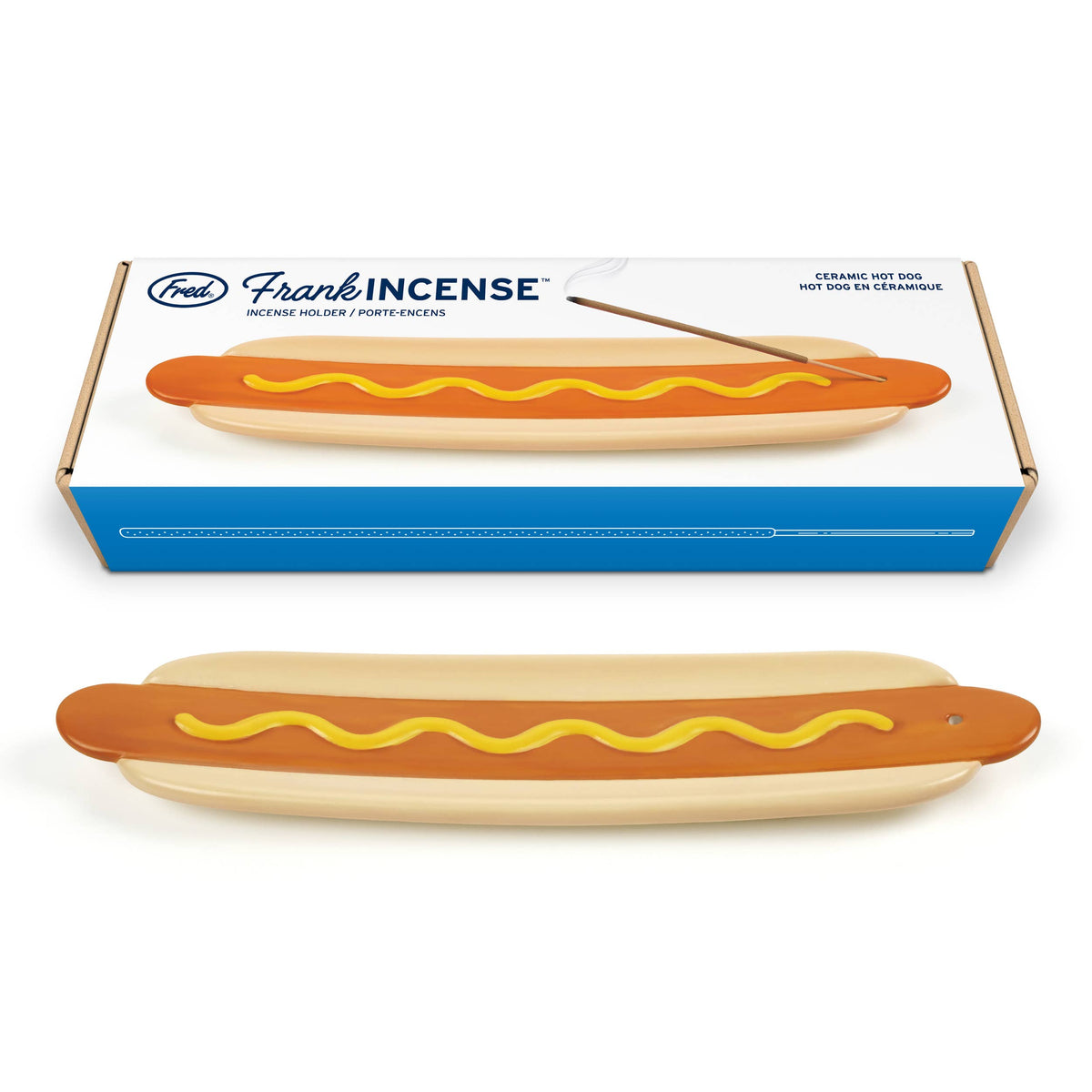 A ceramic hot dog incense holder  shown below its blue and white retail box. The brand 'Fred' and product line 'Frankincense' are visible on the packaging.