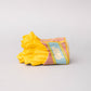 French Fry stress ball squished and laying on its side.