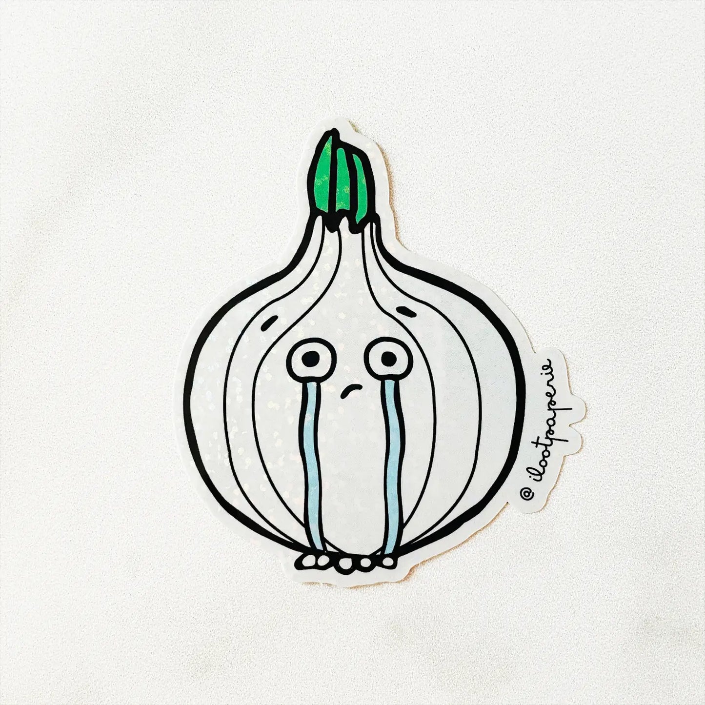 Glittery sticker of a sprouted onion crying. @iIootpaperie