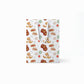 Gift bag with food-themed pattern on a white background