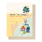 A greeting card with a light brown envelope behind it. The card features a retro-style illustration with the text 'with lots of latkes, PEOPLE I'VE LOVED made in the usa' above a stylized scene of a table filled with potted plants, fruit, and a patterned tablecloth.