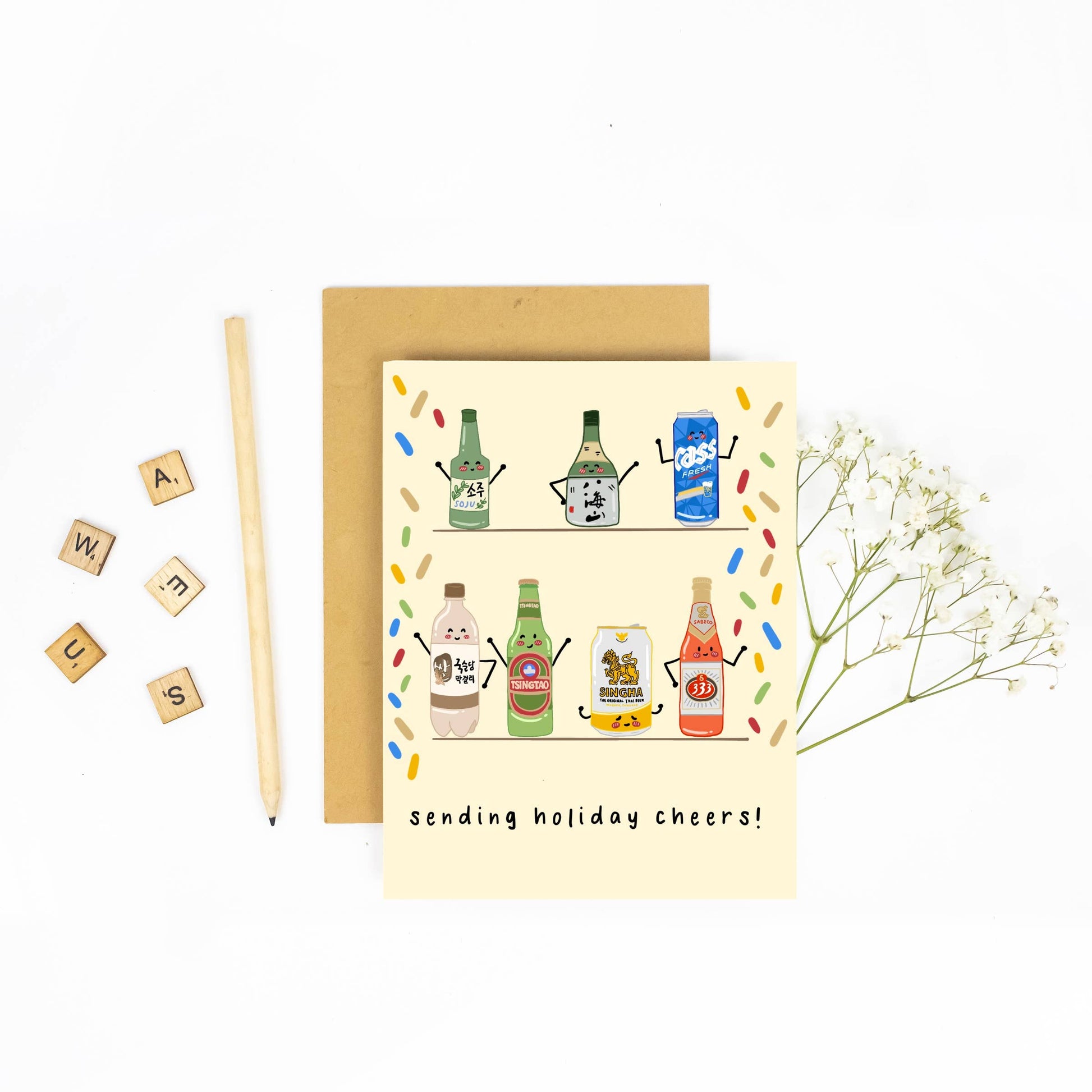 Greeting card with cartoon bottles and 'Sending holiday cheers!' text, accompanied by a pencil and decorative elements on a white background.