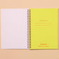 Notebook is open to reveal the inside page which has lines to fill out: If found, please return to: