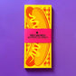 Notepad with colorful design on a purple background