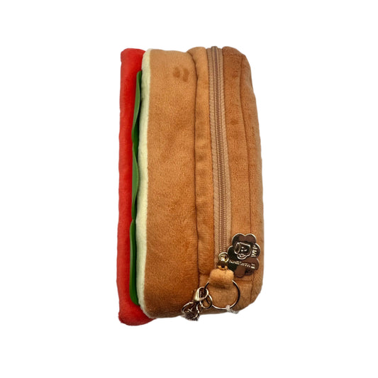 Side angle of hot dog pouch to show zipper and charm/ clasp detail.