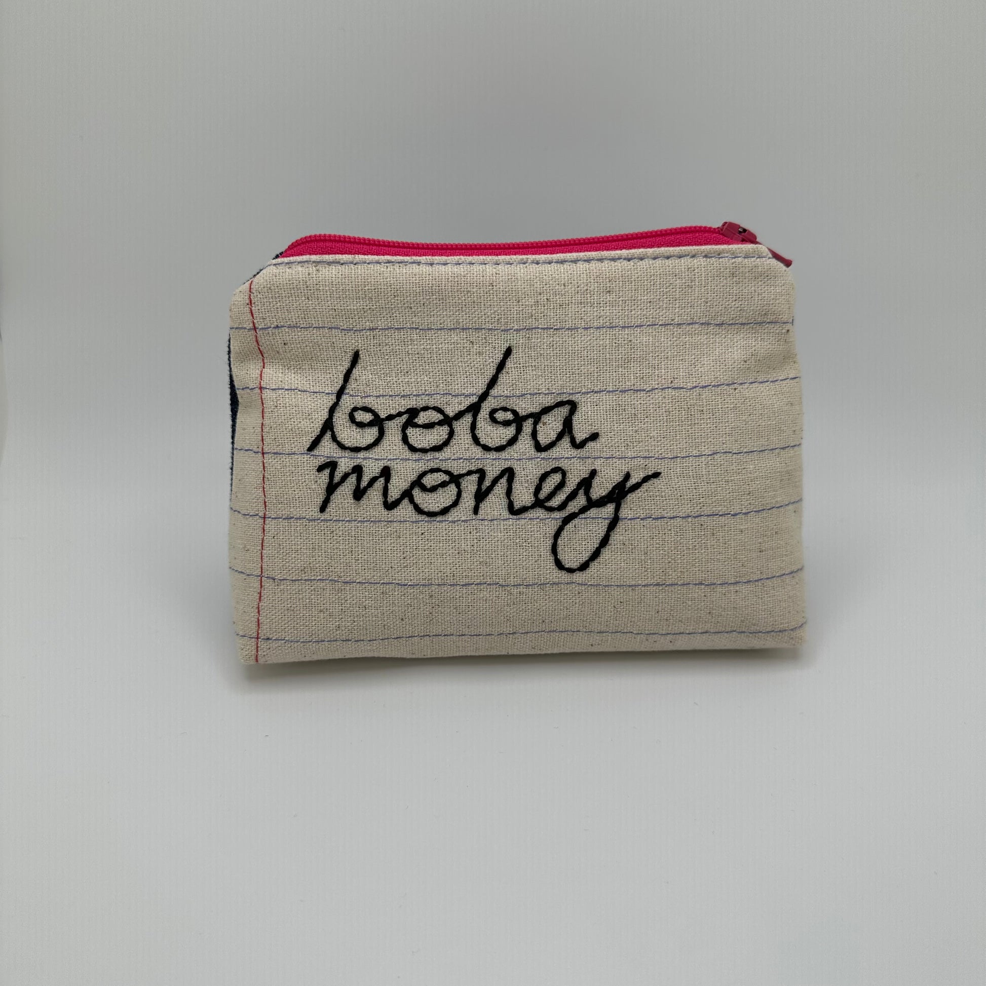 Handmade pouch sewn with the words "boba money"
